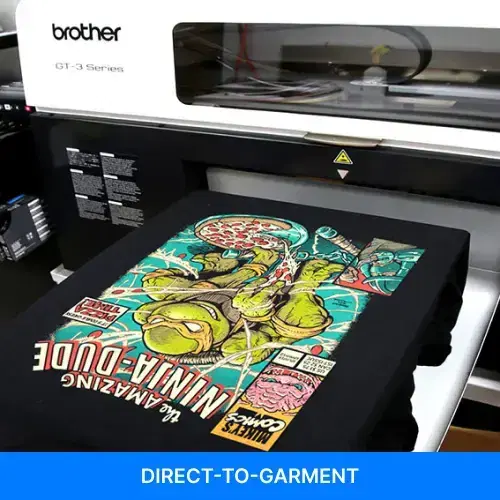 Example of direct-to-garment printing applied to custom t-shirts by a local SameDayCustom fulfillment partner in Pittsburgh, Pennsylvania Example of direct-to-garment printing applied to custom t-shirts by a local SameDayCustom fulfillment partner in Pittsburgh, Pennsylvania